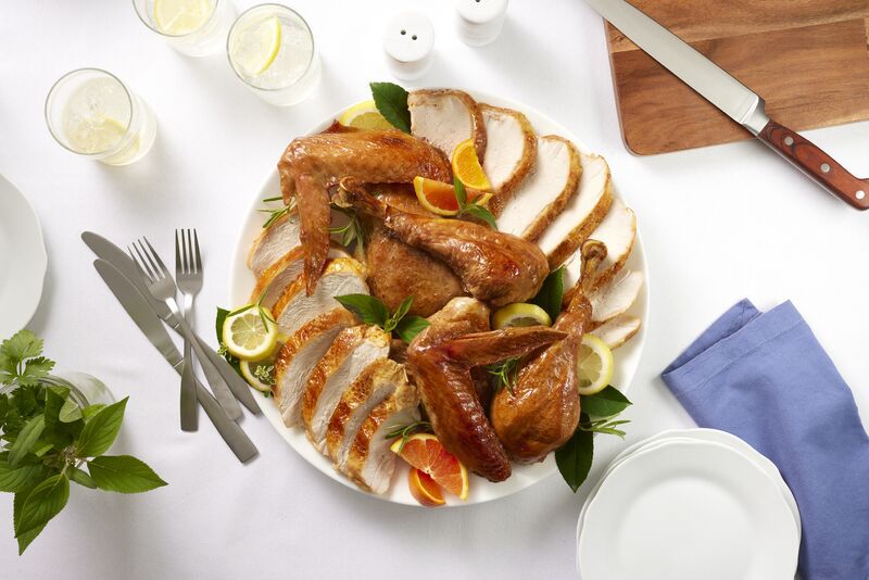 A carved turkey on a serving platter