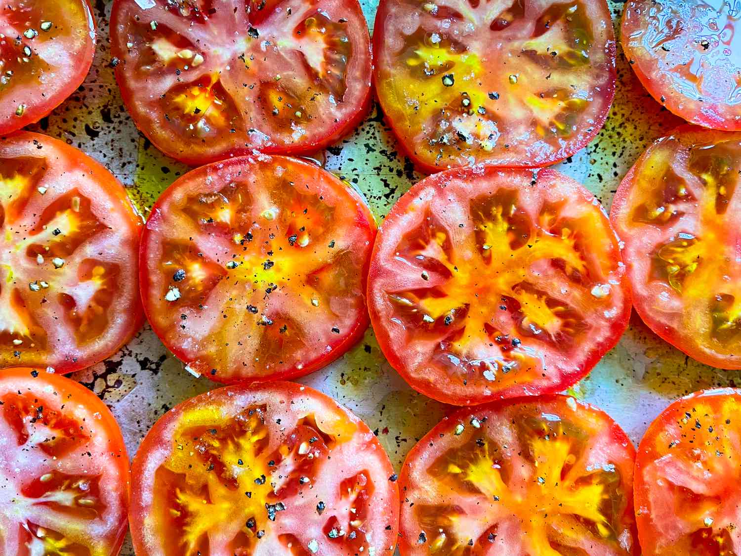 Tomatoes with olive oil, salt, and black pepper