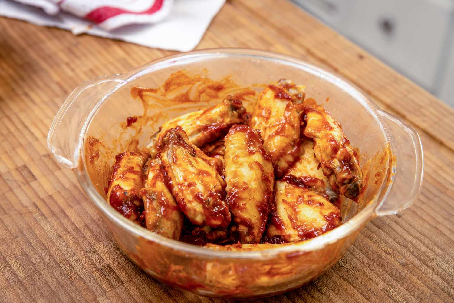 Bowl of Chicken Wings Covered in BBQ Sauce for Microwave BBQ Chicken Wings 