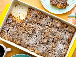 Banana bread breakfast casserole in a yellow baking dish on a table