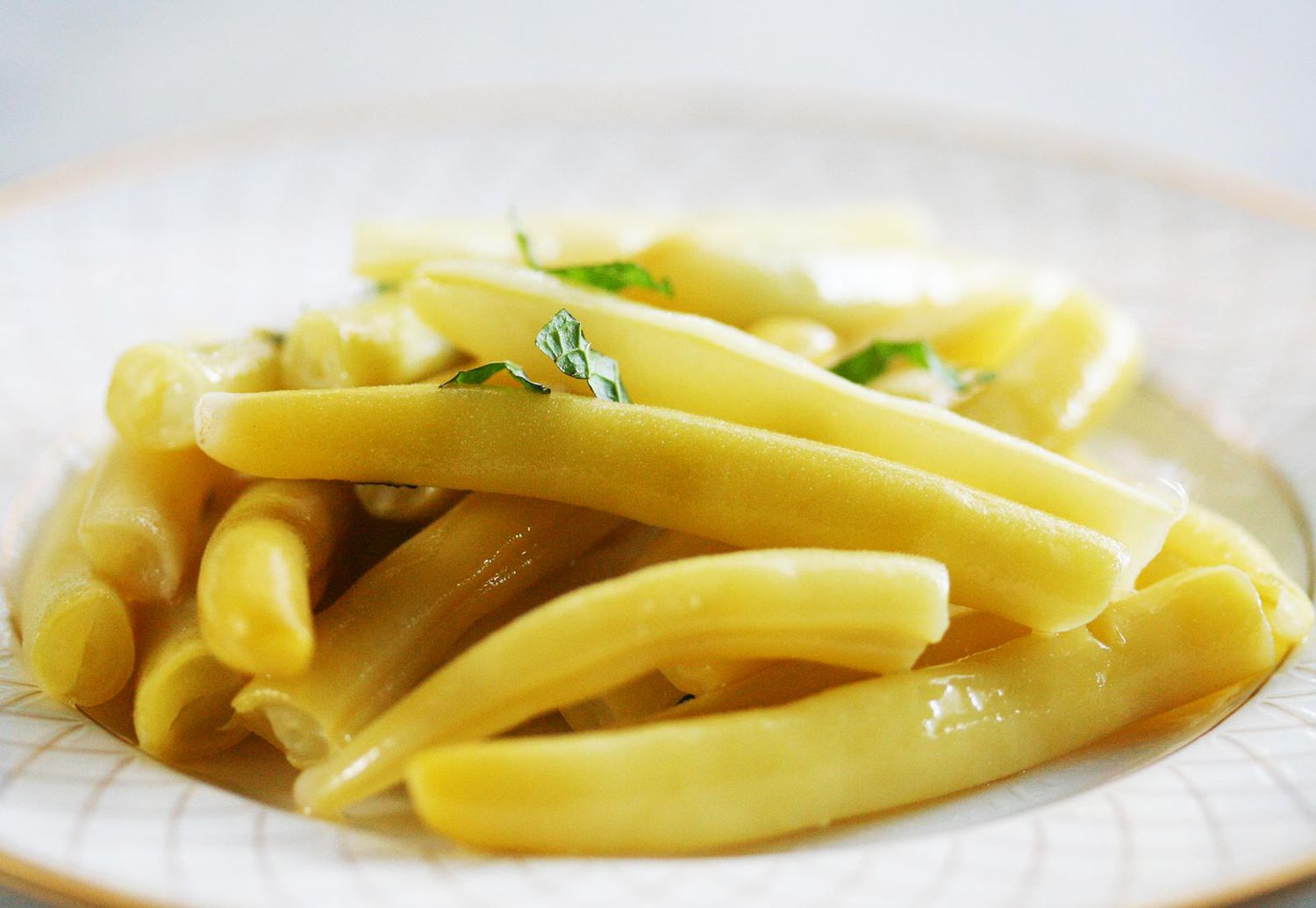 Dish of wax beans cooked with mint