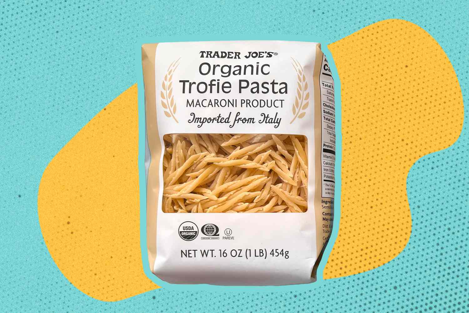 Trader Joe's Organic Trofie Pasta on a yellow and blue color blob background