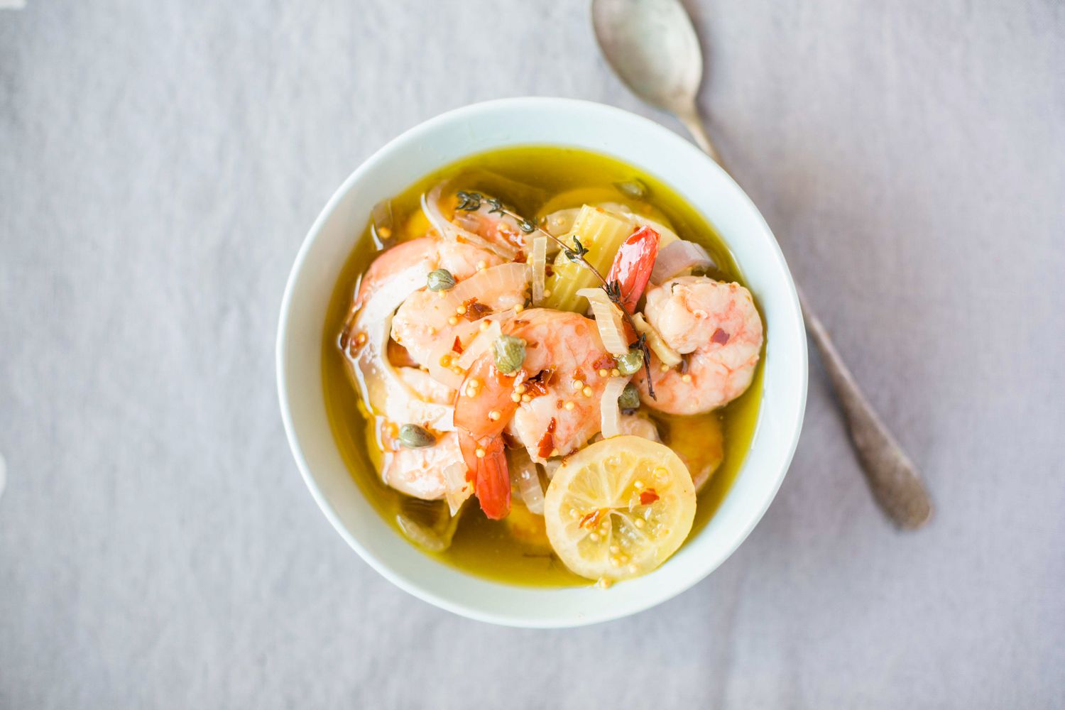 Pickled Shrimp in a Bowl with a Spoon on the Side