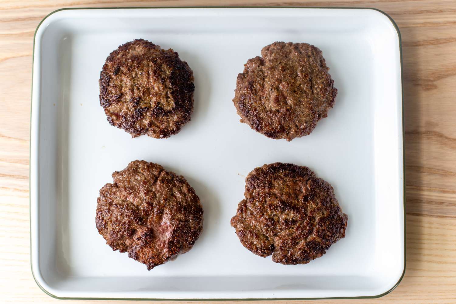 Cooked Patties Resting on a Platter