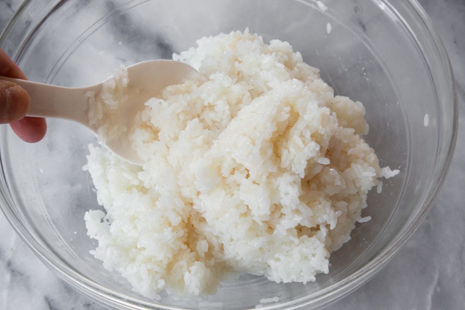 Sushi Rice Mixed Using Rice Paddle