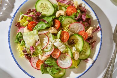 Salad on a blue-rimmed plate