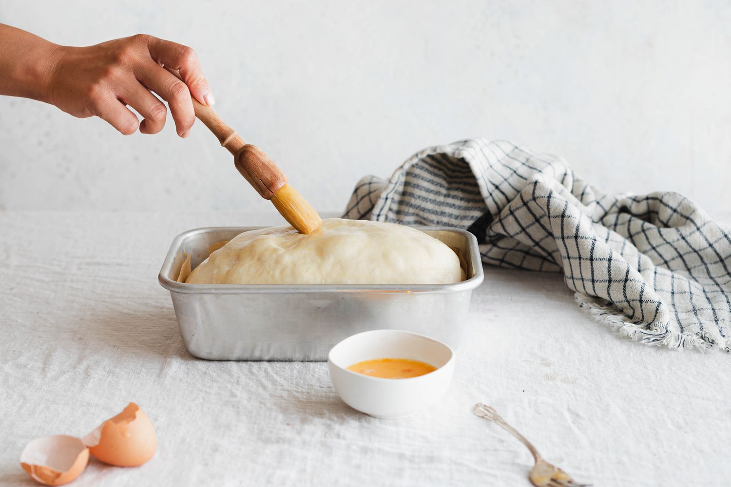 Egg Wash Applied Using a Pastry Brush to Proofed Sourdough Sandwich Loaf 