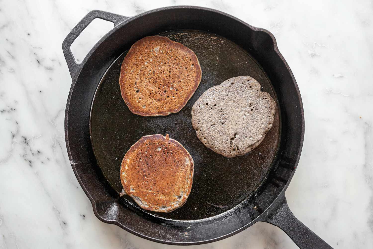 Buckwheat Pancakes Flipped on the Cast Iron Skillet