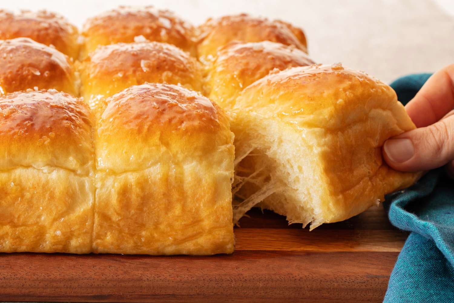 A salted honey roll pulled from the rest of the rolls 