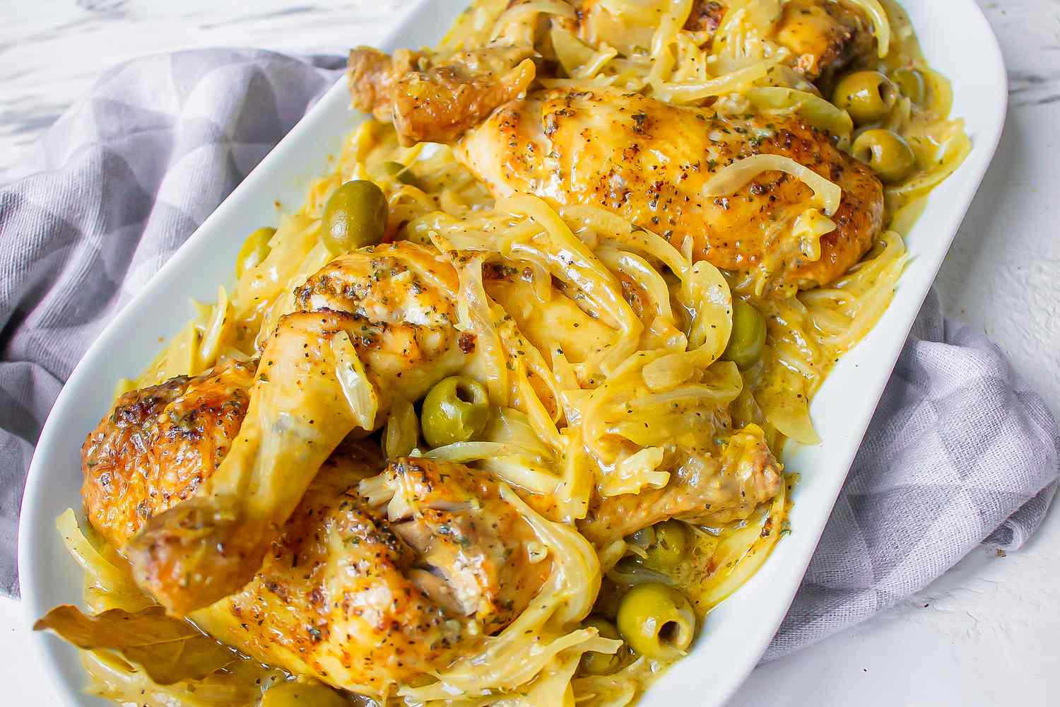 Easy chicken yassa with onion mustard sauce and olives 