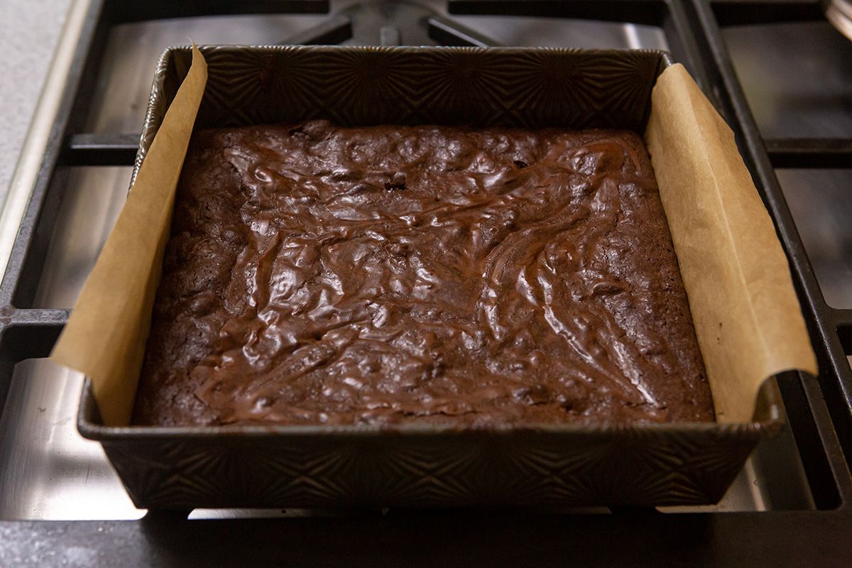 A pan of brownies cooling on the stovetop.