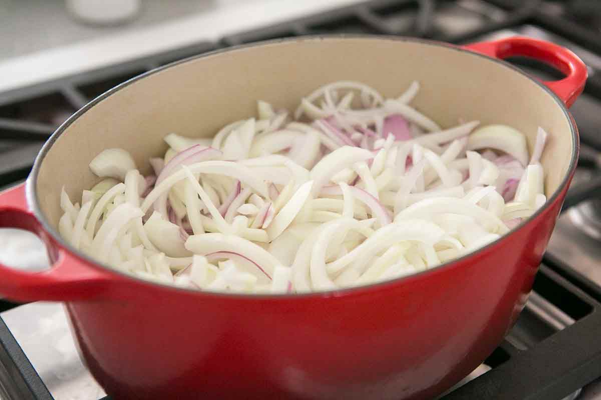 Chopped onions resting in a large pot