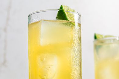 Mezcal Shandy cocktails garnished with lime slices