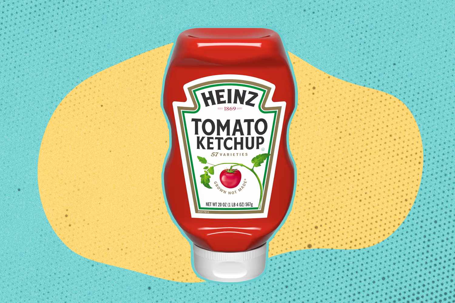 A bottle of Heinz Tomato Ketchup on a yellow and blue speckled background