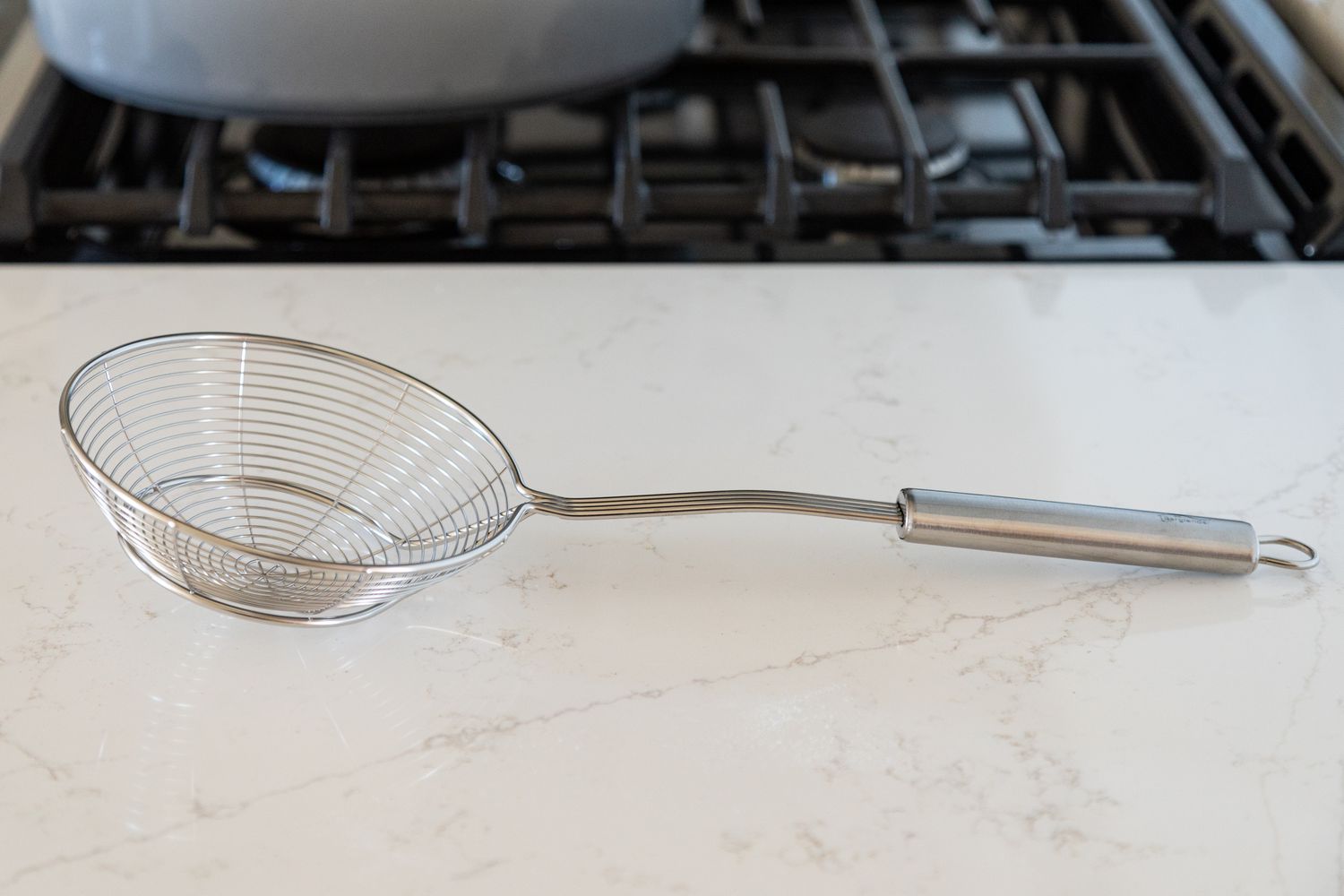 Spider strainer on a counter 