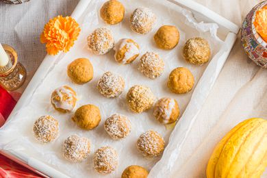 Pumpkin Ladoo on a Tray with Flowers
