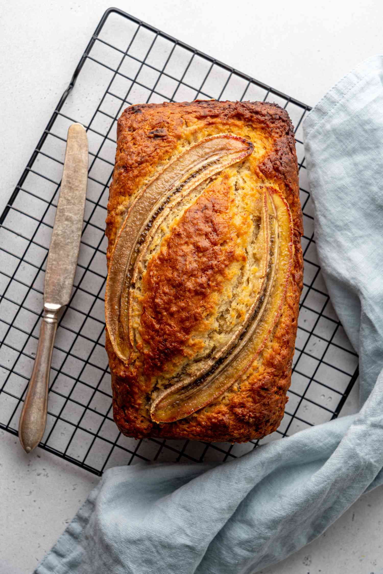 Banana bread with a halved banana on top