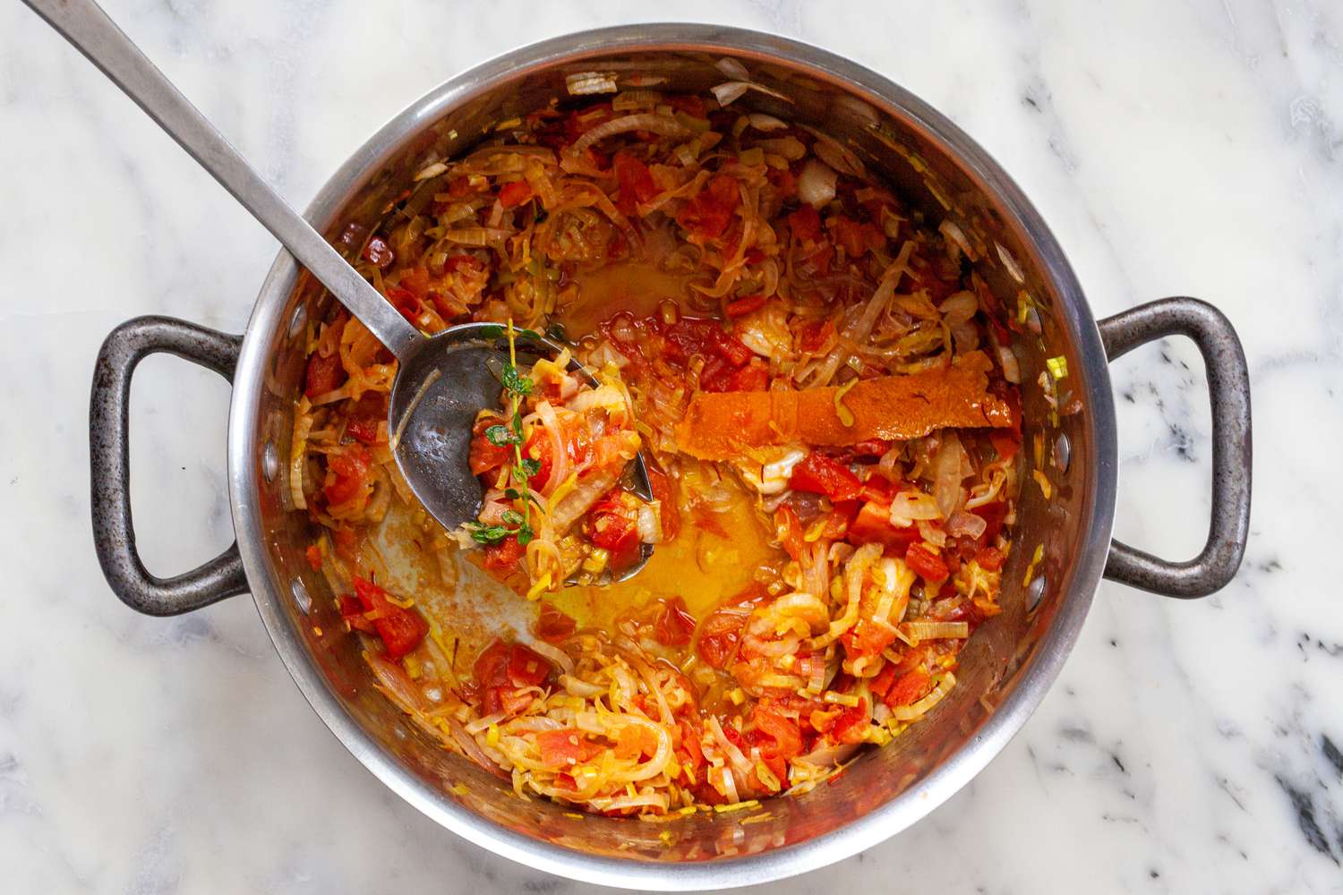 Making the base for a bouillabaisse recipe.