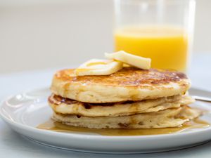 Pancakes and a glass of orange juice