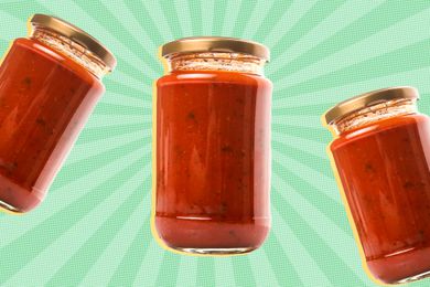 Three jars of marinara sauce with no labels