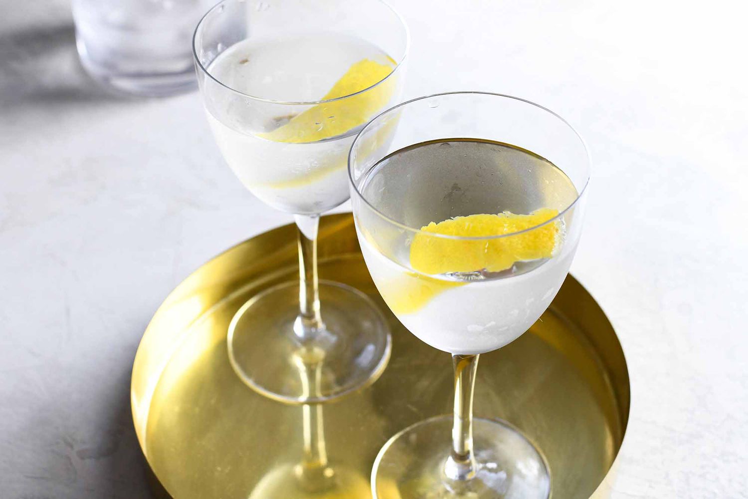 Vodka Martini Stirred Recipe two martinis on gold tray