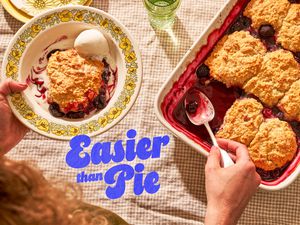 Cherry cobbler in a baking dish with text overlay "Easier Than Pie"