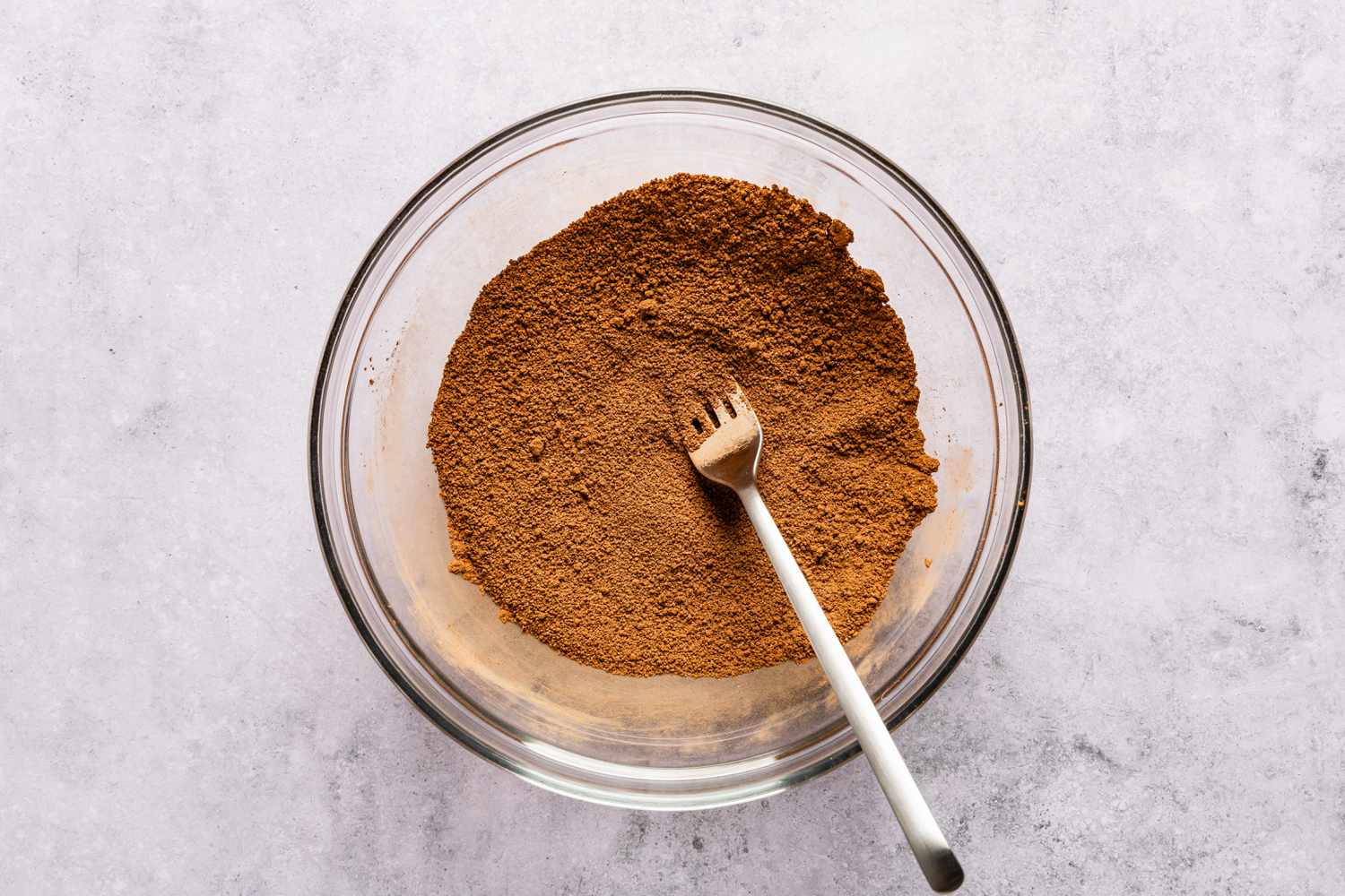 dry ingredients for second cake layer mixed together in a bowl for chocolate pudding cake recipe
