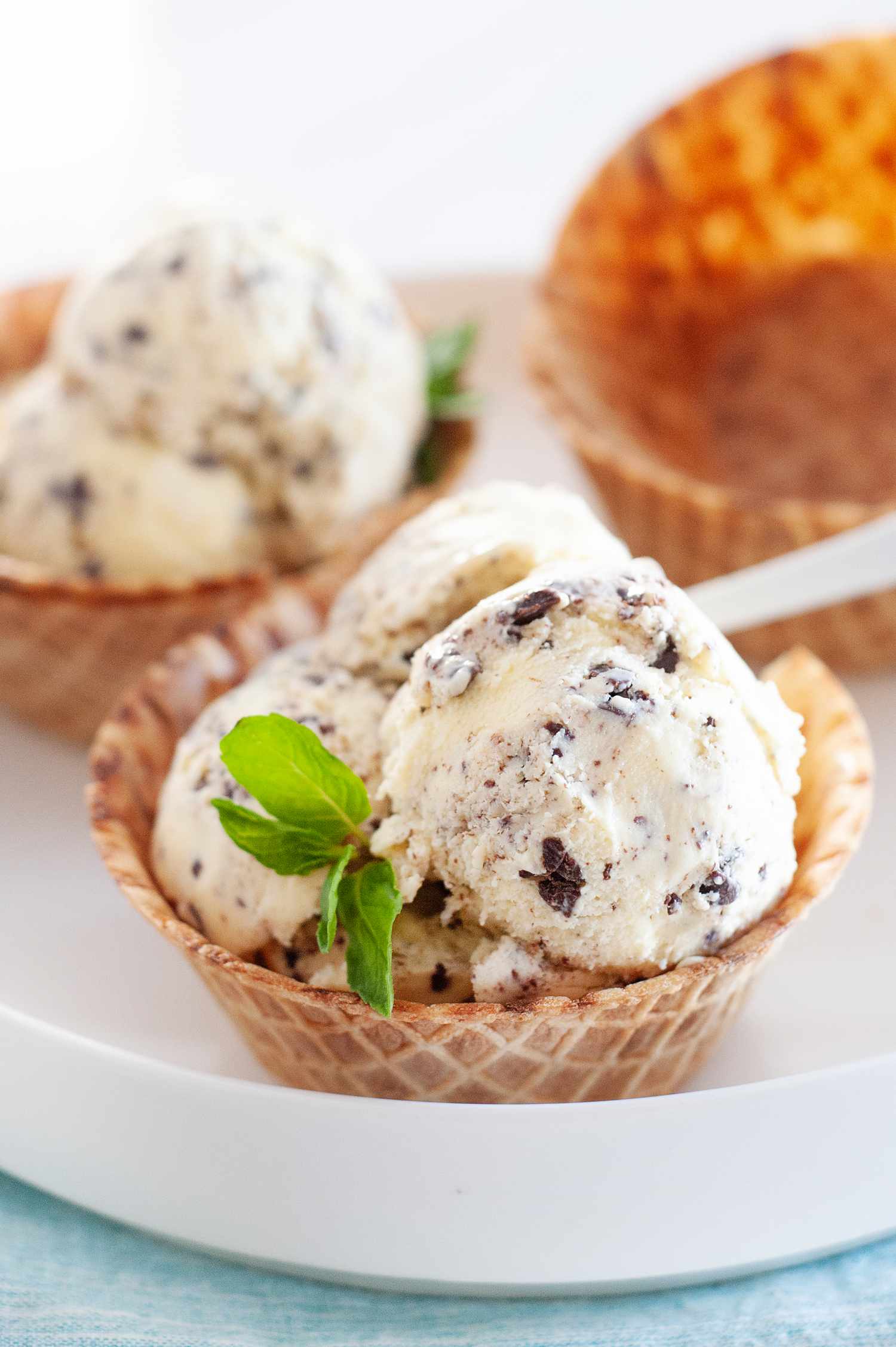 Mint chocolate chip ice cream served in waffle cups.