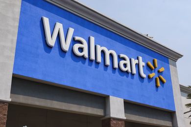 The facade of a Walmart store with the company logo prominently displayed