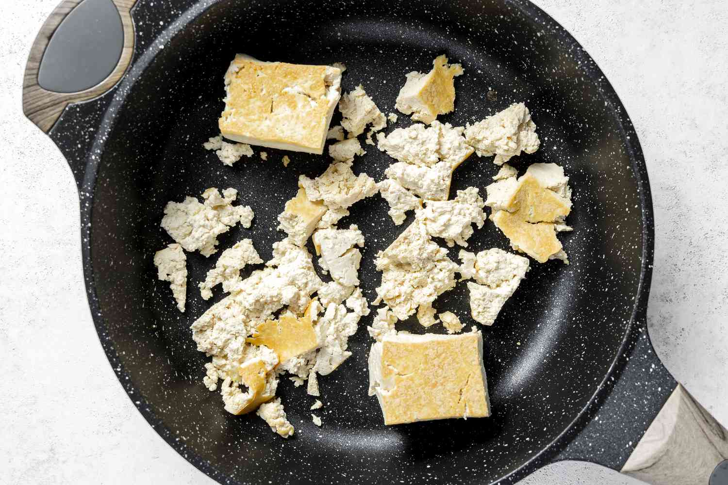 Tofu Blocks (Some Broken) Dry Fried on a Skillet for Chipotle Sofritas Recipe