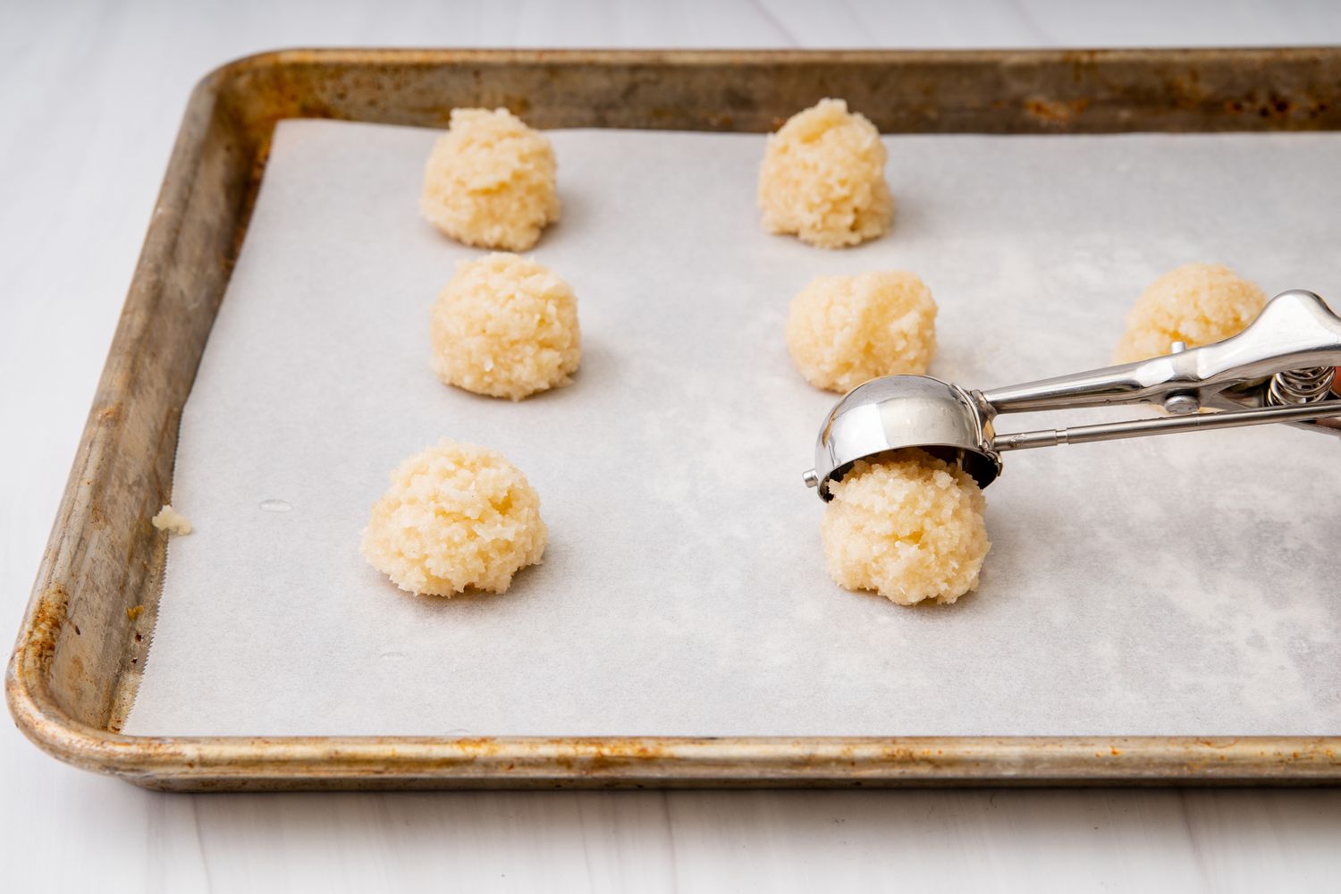 Coconut Macaroons scooped out on a baking sheet