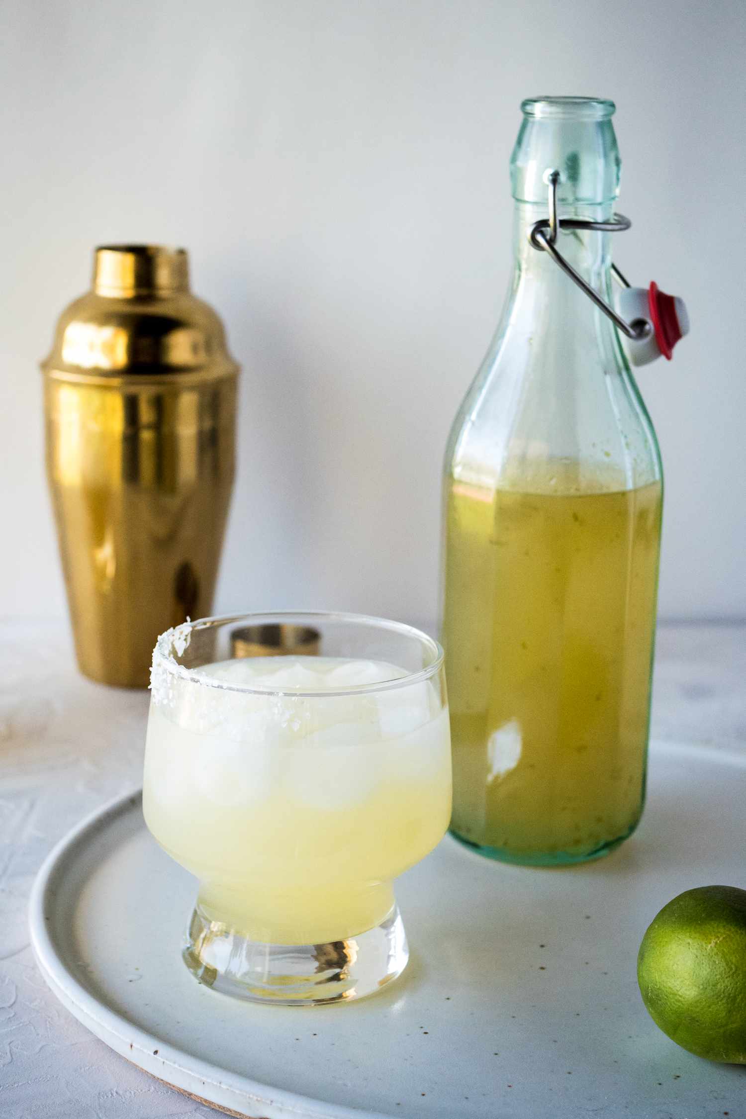 A margarita in a glass with homemade margarita mix.