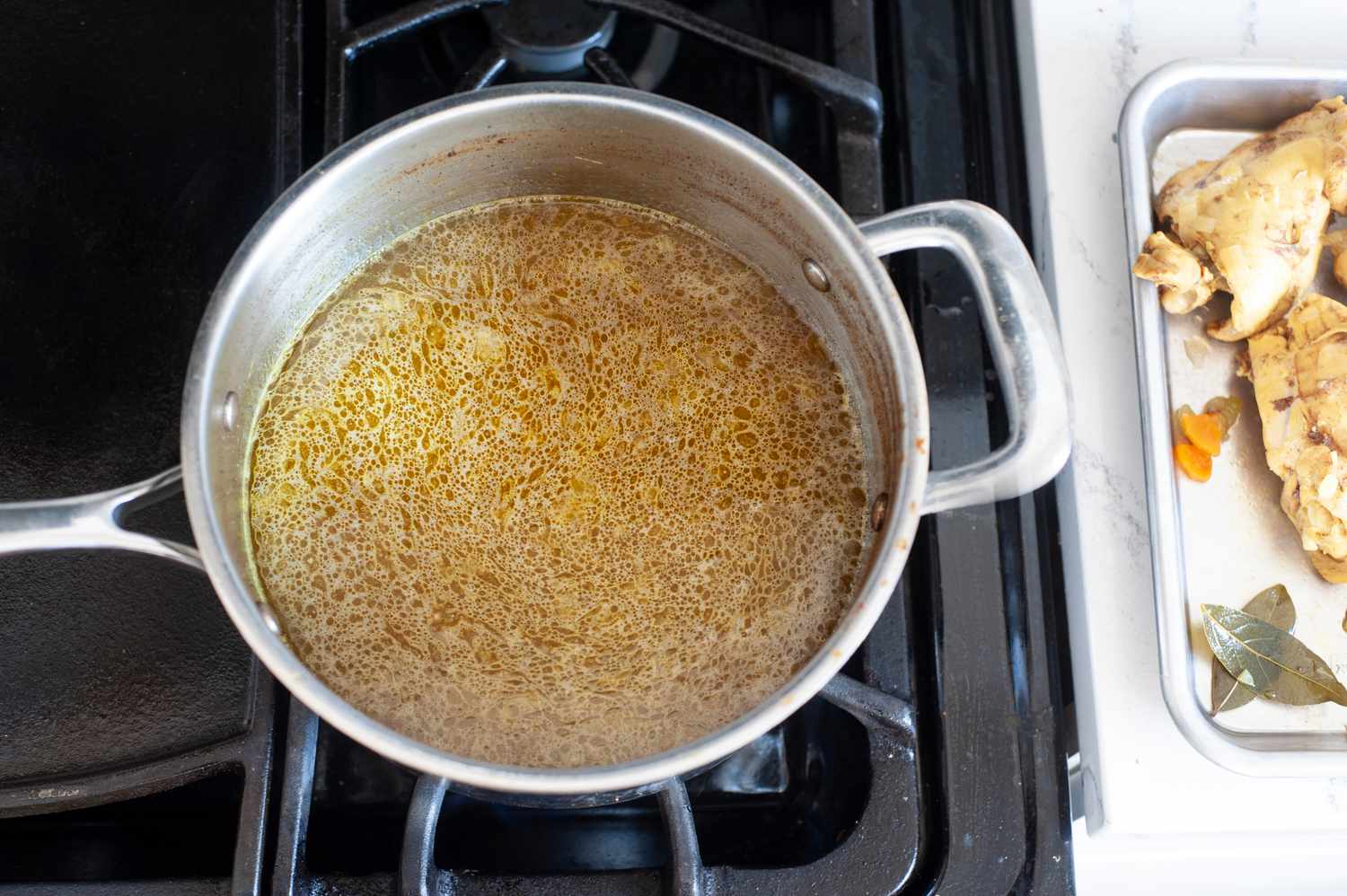 “Ripe Figs” lemon chicken soup being made in a stock pot on the stove.