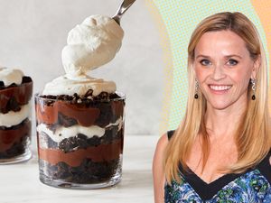 Reese Witherspoon next to glasses of layered dessert being served with whipped cream