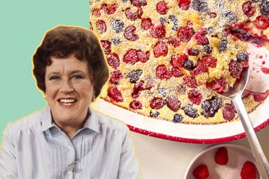 Julia Child alongside a berry-filled clafoutis in a serving pan