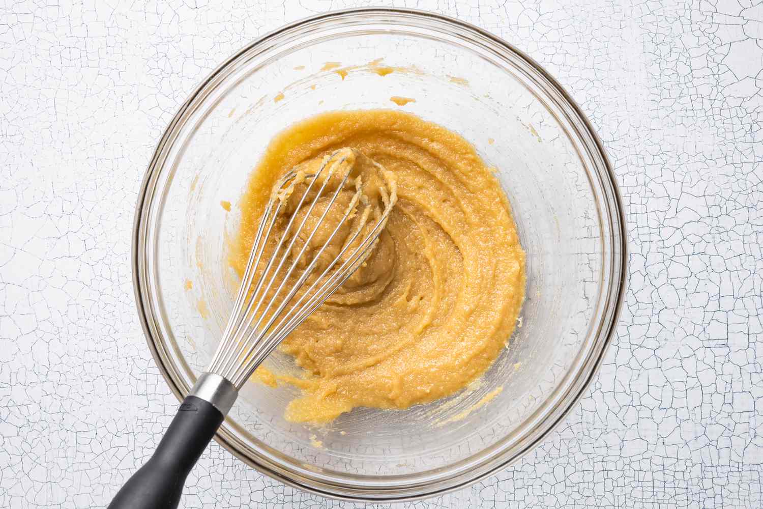 Melted Butter and Sugar Whisked Together in a Bowl for Strawberry Cheesecake Cookie Recipe