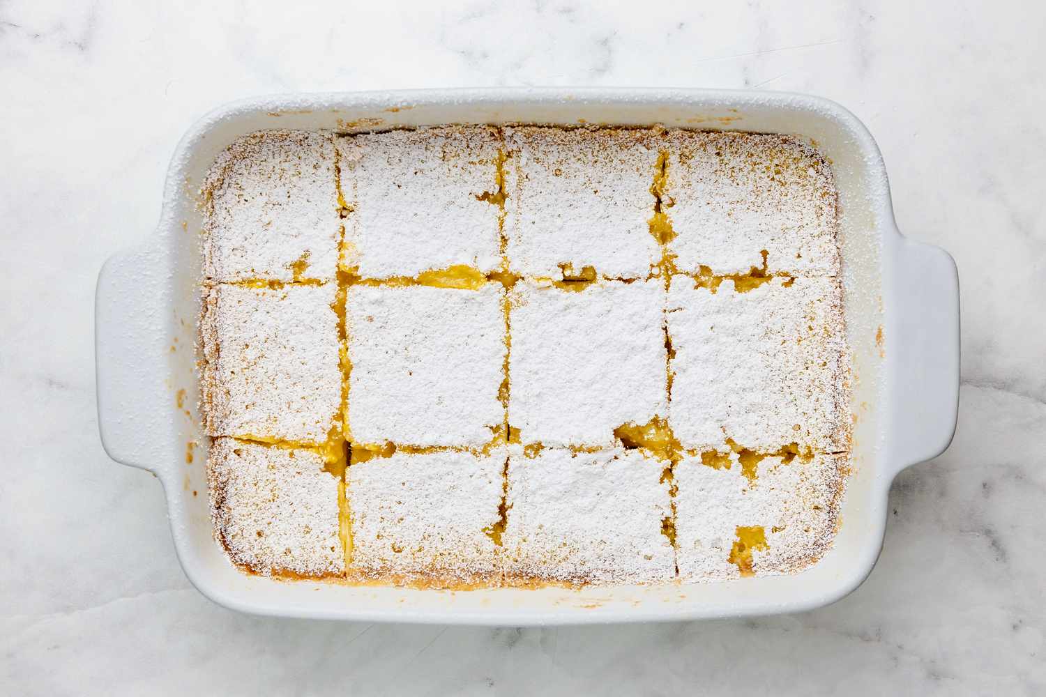 Lemon Bars Cut into Pieces Covered with Powdered Sugar 