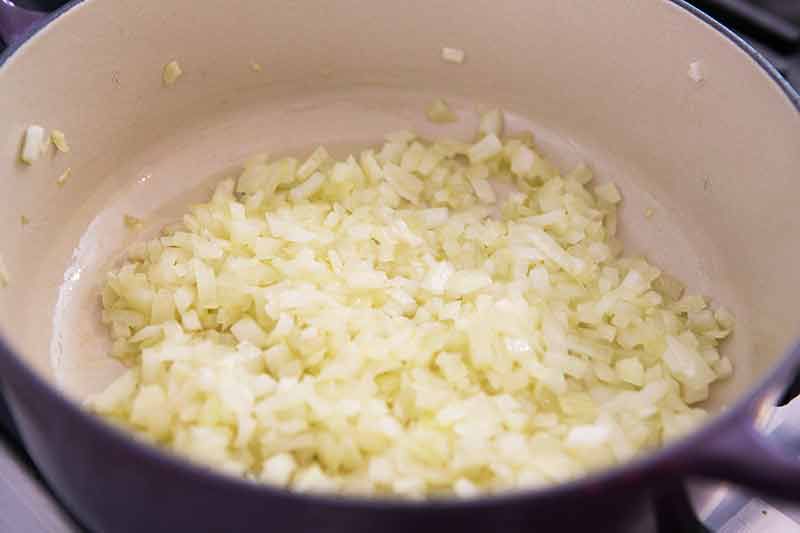 onions cooking in a pot