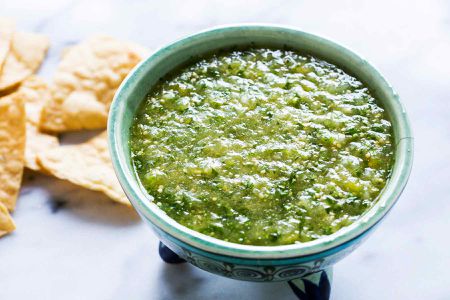 Tomatillo Salsa Verde in a green bowl 
