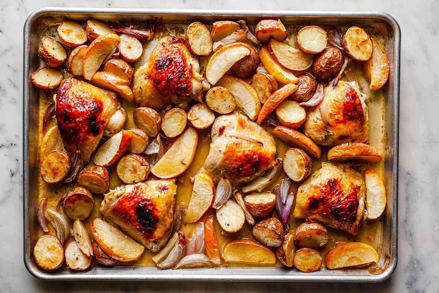 Sheet Pan Honey Roasted Chicken Thighs with Baby Potatoes, Apples, Shallots, and Thyme