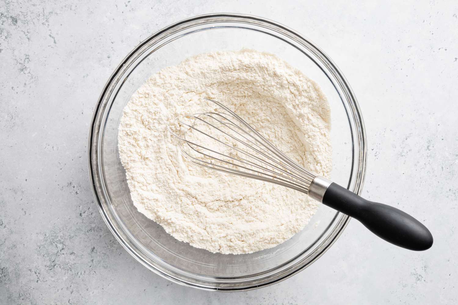 Bowl of Dry Ingredients with a Whisk for Lemon Lavender Cake