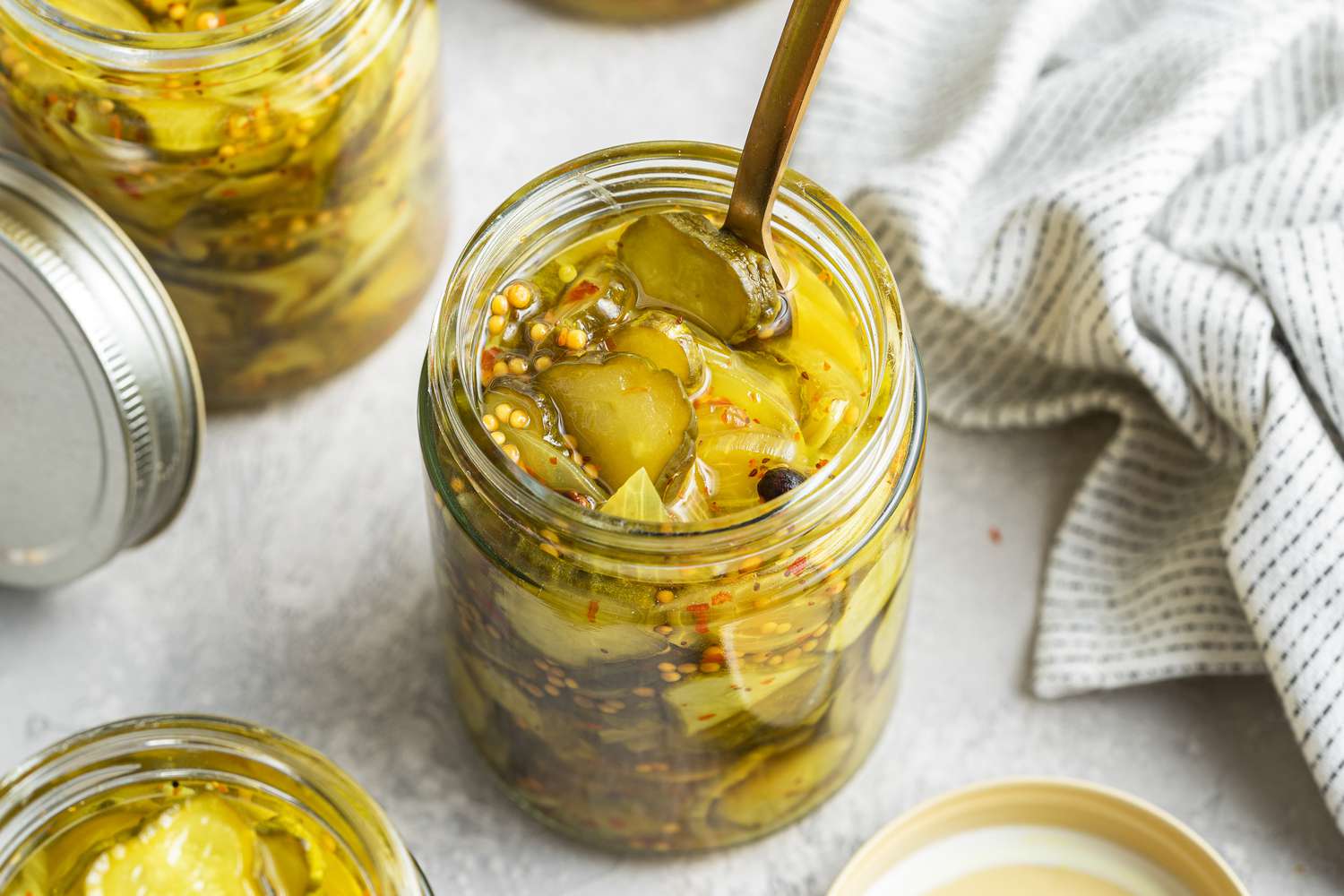 Bread and Butter Pickles in a Jar with a Fork 