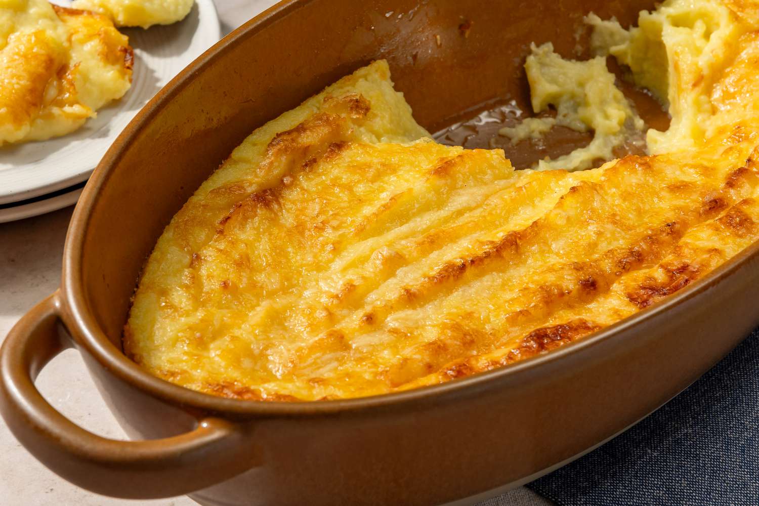 dish of Chantilly Potatoes with a scoop removed