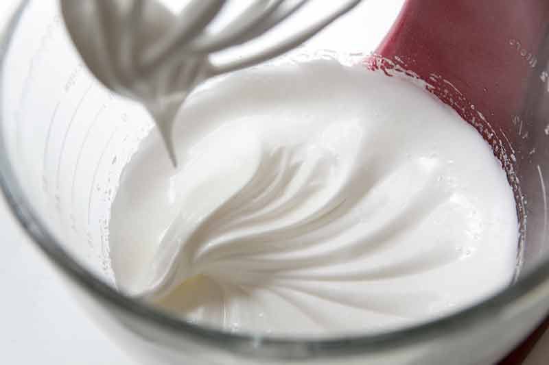 Meringue forming soft peaks for best lemon meringue pie