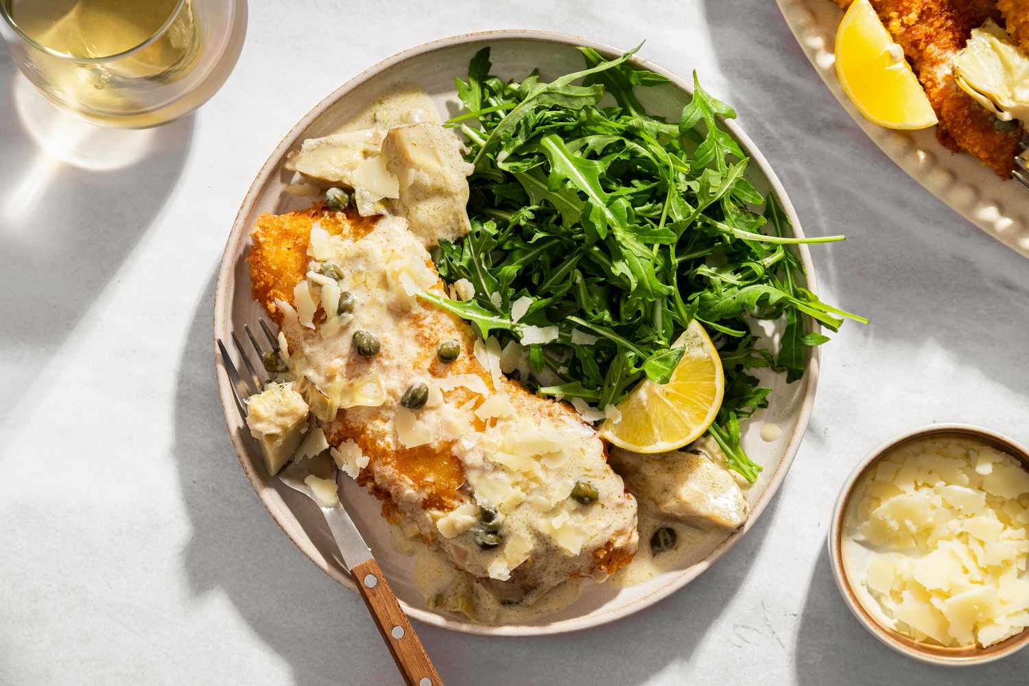 overhead view of a serving of Lemon-Artichoke Chicken Piccata