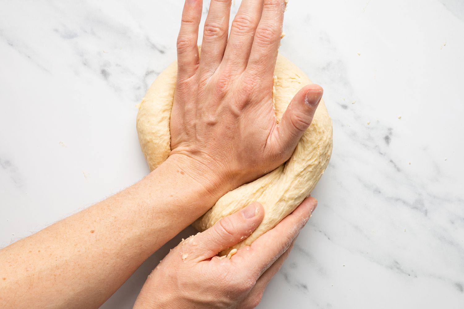 Knead Pepperoni Roll Dough on Counter Using Both Hands