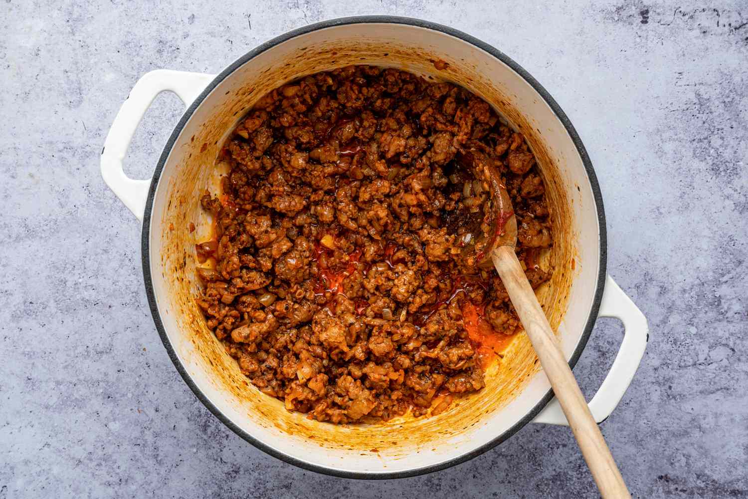 Aromatics, Tomato Paste, and Seasoning Mixed Into Cooked Sausage for Lasagna Soup Recipe