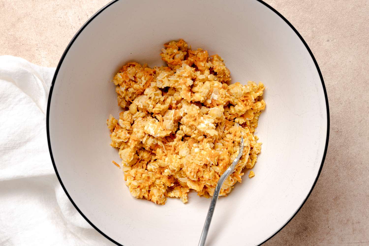 Bowl of Mashed Chickpeas with Grated Carrots and Goat Cheese for Panini Recipe