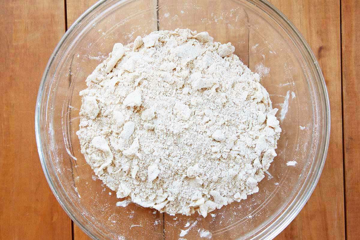 Crumb topping mixed in a glass bowl to make the best shoofly pie.