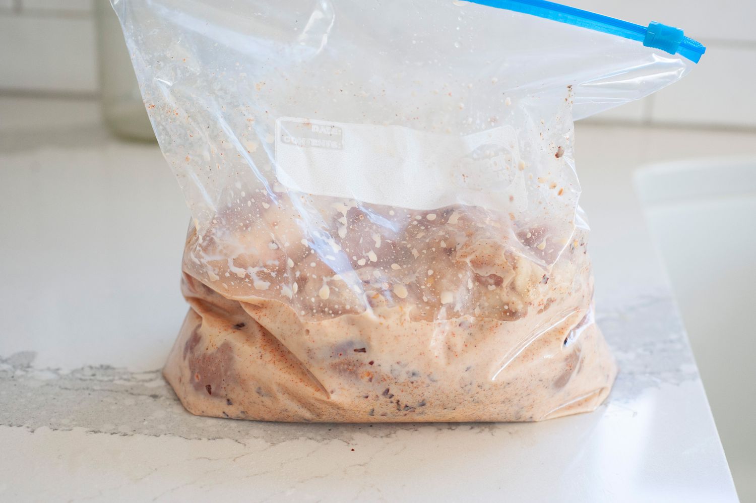 Marinating chicken in a plastic bag